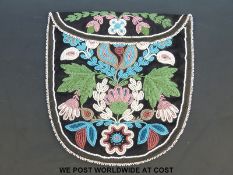 A late 19thC North American bead work purse