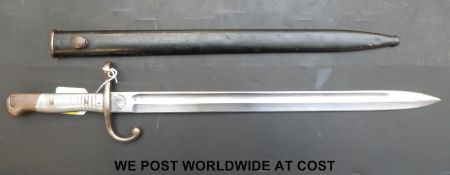 An Argentinan 1891 pattern Mauser rifle bayonet and metal scabbard,