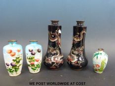 A pair of Chinese cloisonne vases with fine dragon decoration,