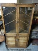 An Art Deco oak display cabinet,