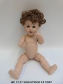 Simon & Halbig all bisque doll with open mouth, fixed brown eyes, brown hair and jointed body,