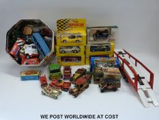 A collection of Matchbox, Corgi, Lesney and other diecast model vehicles, some in original boxes.