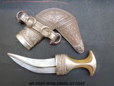 A Middle Eastern jambiya dagger with horn handle,