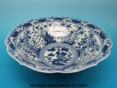 A Chinese blue and white bowl with six character mark to base (13cm diameter)