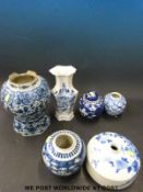 A collection of Chinese blue and white ceramics to include ginger jars,