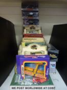 Twenty-four Matchbox, Dinky and other diecast model vehicles, all in original boxes.