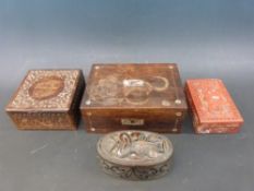 A collection of boxes to include Maori and cinnabar lacquer examples and two others