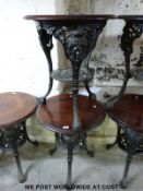 Two mahogany and cast iron pub tables (H70cm,