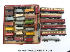 Thirty two Hornby Dublo 00 gauge carriages, wagons,