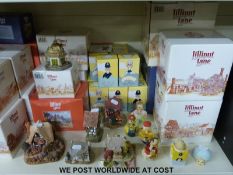 A large quantity of Lilliput Lane items in boxes and some boxed Michael Bowaner figures