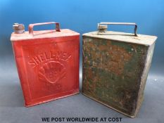 Two 2 gallon petrol cans, a Kismet foot pump,