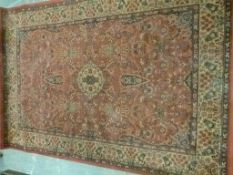 A rug with wine ground (188 x 134cm)