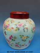 A Chinese vase with floral decoration on aqua ground,