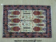 A pair of wool rugs with figural guls (154 x 103cm)