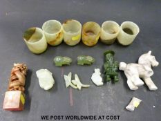 A collection of jadeite cups,