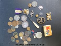 A quantity of collectables to include military and other badges, hallmarked silver medallion,