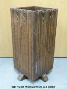 A carved Arts & Crafts umbrella stand /waste paper bin