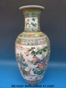 A Chinese famille verte vase with figural decoration (46cm tall)