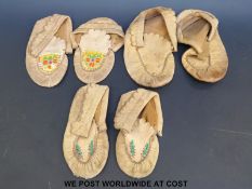 Three pairs of native American moccasins
