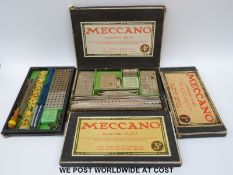 Four Meccano outfits, comprising 1A, 2A, 3A and 4A, each comprising nickel plated components,