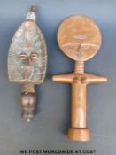 An African tribal fertility figure and a similar example decorated with a copper face (tallest