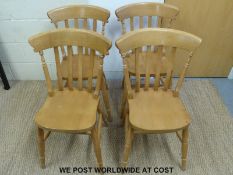 Four beech dining chairs
