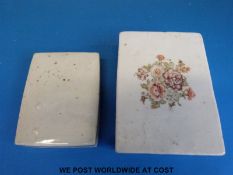 A Chinese lidded ink pot with floral decoration to the lid and Chinese calligraphy within and