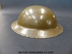 A WWII British Army helmet dated 1941