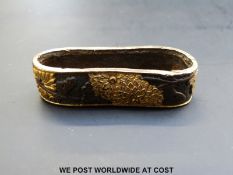 Japanese Edo period sheath collar finely decorated in gilt with flowers on a hammered ground.