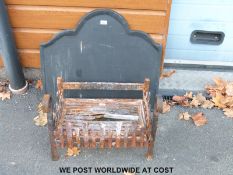 A cast iron grate (H47cm x W55cm x D42cm) and fire back (H69cm x W75cm)