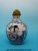 A Chinese enamel snuff bottle decorated with a geisha