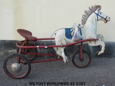 Tri-ang tin plate pedal horse No.7 with moving front legs and sprung seat, 110cm long.