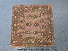 A fine Edwardian embroidered Ottoman throw or panel with red ground and foliate embroidery to the