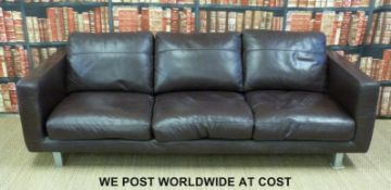 A large brown leather sofa (H65cm x L225cm x D90cm)