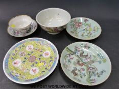 A collection of Chinese tea bowls and plates including famille verte