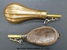 A copper and brass powder flask with reeded decoration,