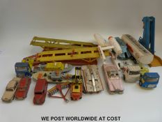 Fifteen Dinky toys and Dinky Supertoys diecast model vehicles including boats, Lady Penelope car,