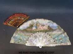 A late 19thC ladies hand fan, the mother of pearl sticks with inlaid gilt and gold decoration,