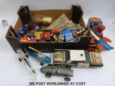 A collection of tinplate and other toys,