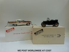 Two Danbury Mint diecast model cars,