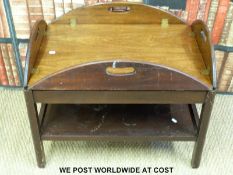 A mahogany butler's table or stand with hinged sides