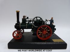 Bassett-Lowke limited edition diecast model traction engine, on wooden display plinth.
