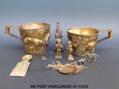 Six Ashanti figures and animals, a spoon,