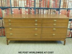 A retro 1960s G-Plan style eight drawer sideboard (W162 x H78 x D43cm)