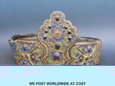 A gilt bronze and enamel Indian or similar belt with cabochon stones and further gilt section to