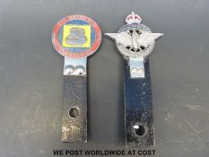 A Civil Service Motoring Association radiator bar badge featuring winged wheel,