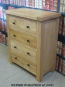 A modern oak chest of four drawers (W80 x H96 x D41cm)