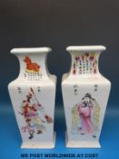A pair of Chinese vases decorated on four sides with scribes, warriors,