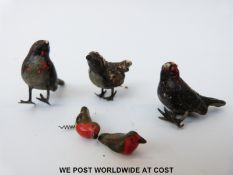 A set of five Britains cake decorations in the form of robins and other birds