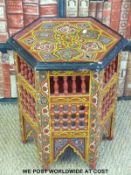 A Moroccan hexagonal occasional table with painted decoration (51cm tall,